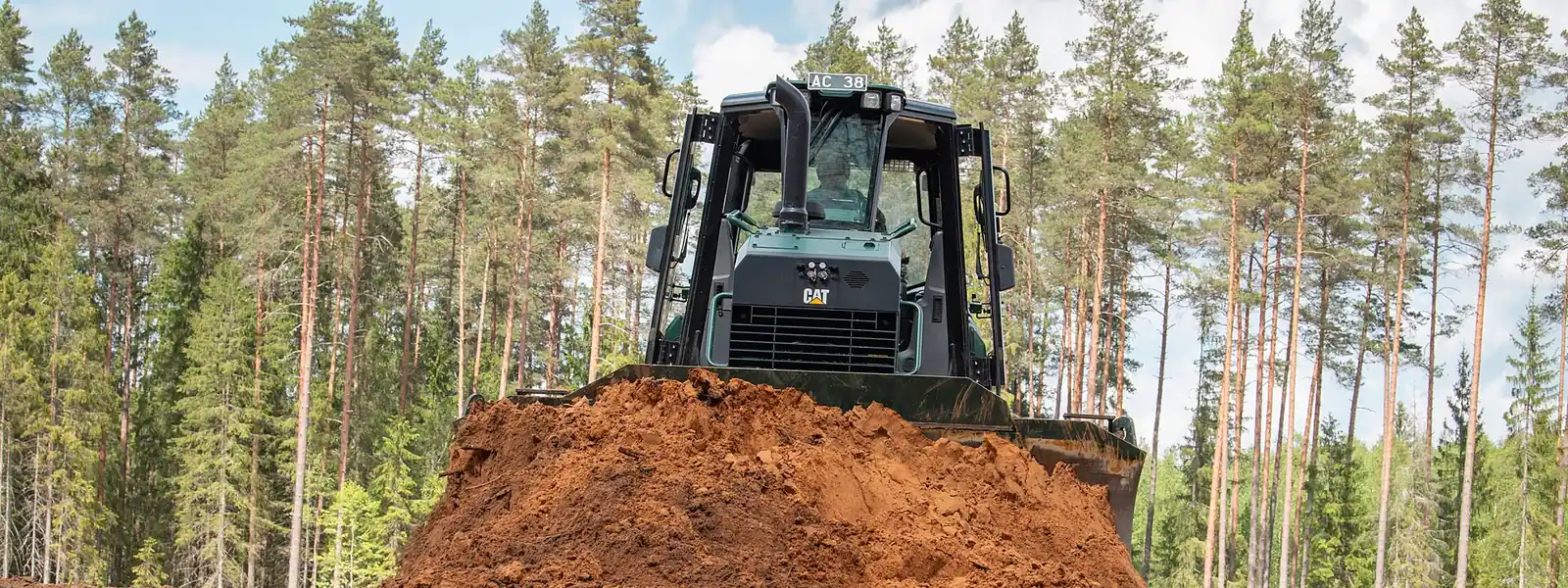 A wide view of earthworks underway on an open site